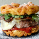 Illustration for article titled Someone Made a Funnel Cake Bacon Cheeseburger and I Just Died Inside